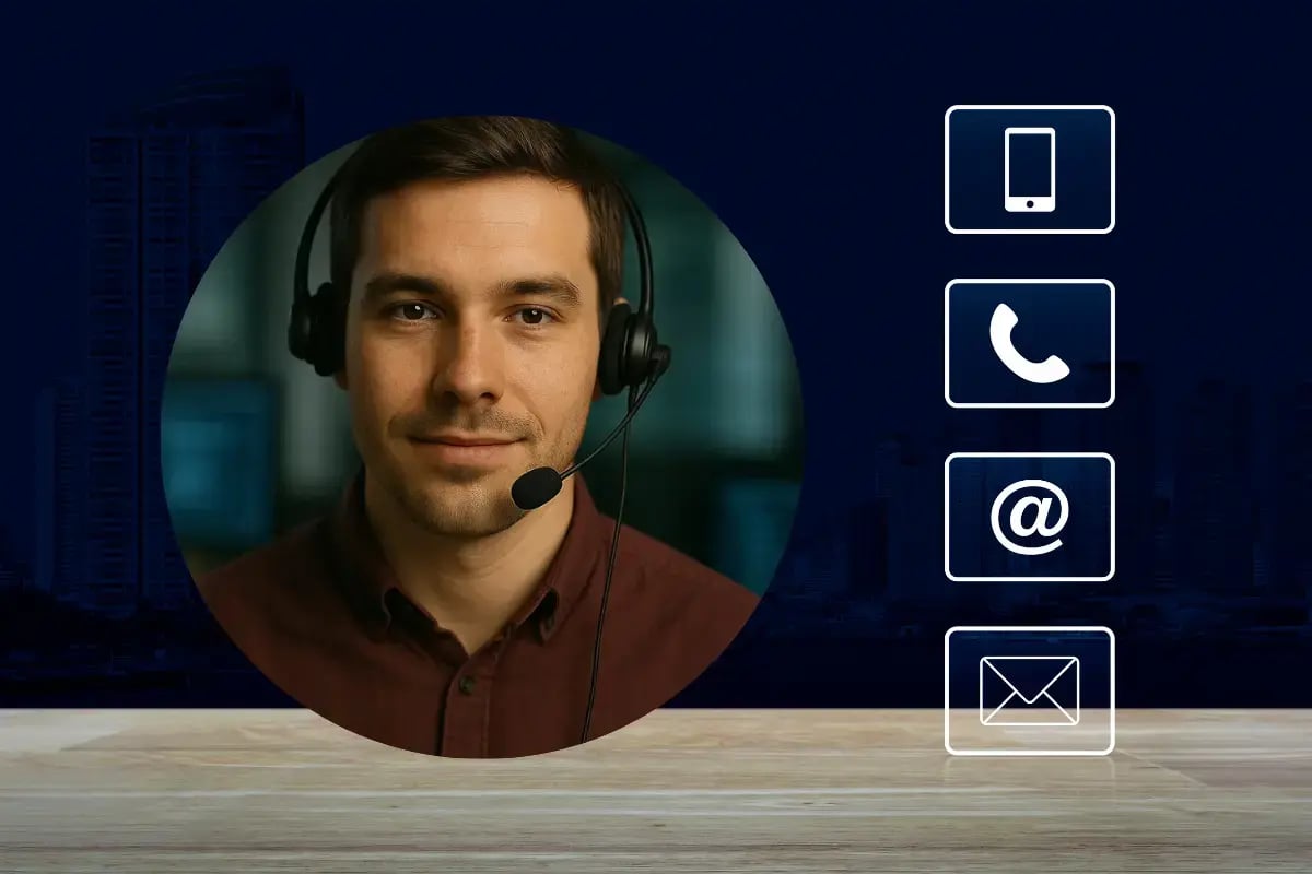 Smiling IT help desk specialist providing remote support via headset