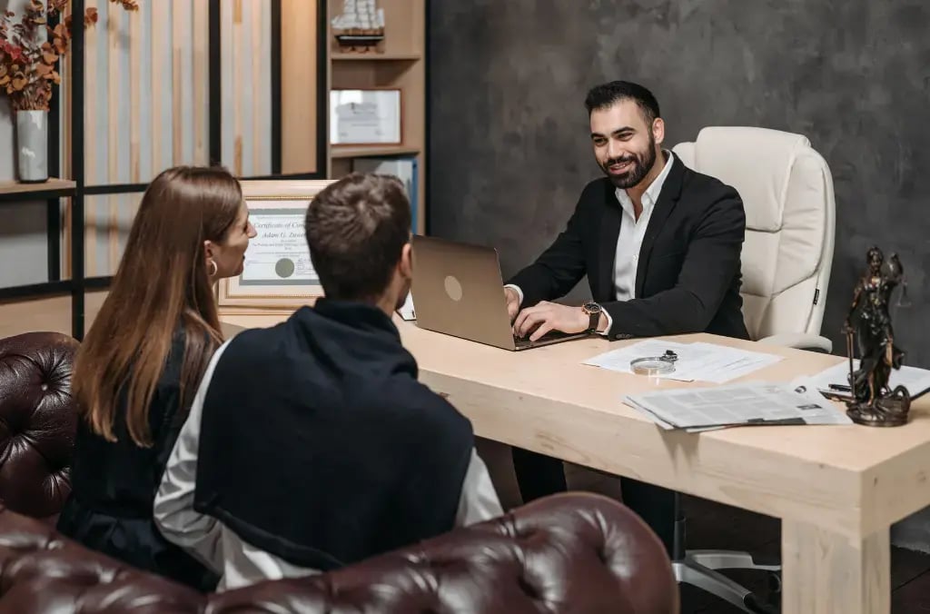 lawyer meeting with clients